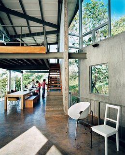Welcome to the Jungle - Photo 4 of 8 - Exposed beams and a cantilevered loft soar over the high-traffic eating area, giving the family a sense of spaciousness.