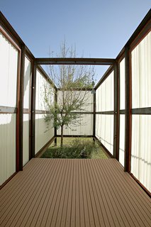 "It's really nice waking up to having a tree in your bedroom," says Matthew Selanger of the innovative sleeping structures he designed with his wife, Maria. "When we sleep in a standard bedroom now, we really miss the pod."