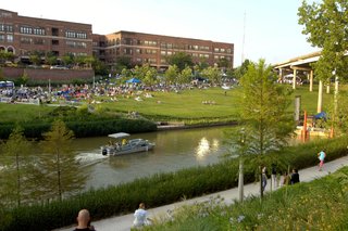 Houstonians enjoy the Blue Bayou Festival along the banks of the Buffalo Bayou. The city's annual calendar also includes the Bullunar hot-air balloon festival, the Bayou City Arts Festival, the Art Car Parade, the Livestock Show and Rodeo, the International Festival, and more. Image courtesy of the Greater Houston Convention and Visitors Bureau.