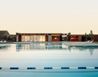 This public pool house was designed to merge with its park surroundings. Translucent wall materials, floating overhead planes, and plenty of windows let the light in.<br><br>Project: Stapleton Neighborhood Pool House<br><br>Architect: Semple Brown Design<br><br>Location: Denver, Colorado