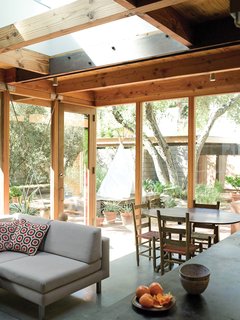 Compound Addition - Photo 8 of 12 - Separated only by large expanses of glass, the interior and exterior landscape flow together.