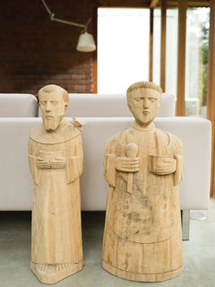 Compound Addition - Photo 11 of 12 - The Arnolds consider Francis and Paschal the patron saints of their home, representing moderation or austerity tempered by generous hospitality.