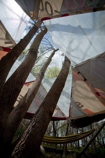 Gimme Shelter - Photo 5 of 9 - Rain Sail by Team Strada, Alexa Rosse and Ari Miller<br><br>Constructed of recycled billboard material, this structure features hammocks under saillike wings of fabric that collect rain to power generators and light the structure at night.<br><br>Photo by Jack Ramsdale. Courtesy of the Schuylkill Center for Environmental Education.