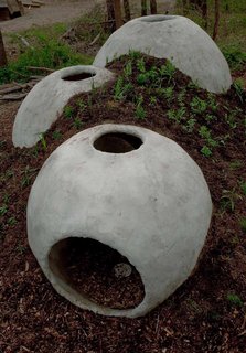 Gimme Shelter - Photo 6 of 9 - Bird-Seed Shelter by Julia Molloy and Taka Sarui<br><br>The earthen structure is made from a mixture of mud, seeds, nuts, and water from which native grasses and flowers will grow and to which birds will visit for food and shelter.<br><br>Photo by Jack Ramsdale. Courtesy of the Schuylkill Center for Environmental Education.