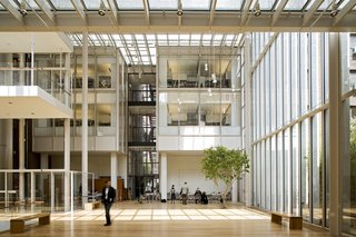 I was stunned at how open and light the whole addition felt, a truly modern connection between two old buildings. At times the atrium seemed to float away, leaving a neutral courtyard between Morgan's two haunts. Photograph by Michel Denancé