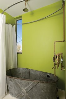 The bathroom. Austin sourced most of the materials from Architectural Salvage of San Diego. Photo by David Harrison.