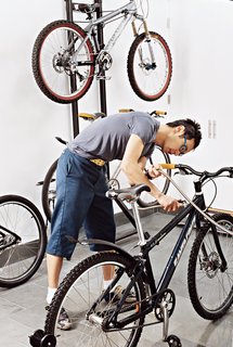 Between the kitchen and main entrance is a large mudroom where Andy keeps "a bike for every season, including two one-speeds." The slate floor, with a drain and a hose in the wall, facilitates mud removal.