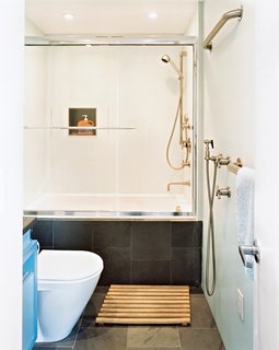 Their bathroom has walls of watertight Plexiglas. "They were so easy to set up," John says, "the contractors installed all six bathrooms in one day."