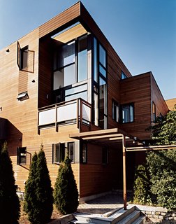 The building’s south elevation. The lofty double-height balcony, with windows leading into his study, shows how the architects’ break from the triple-decker’s usual horizontality created dramatic results.