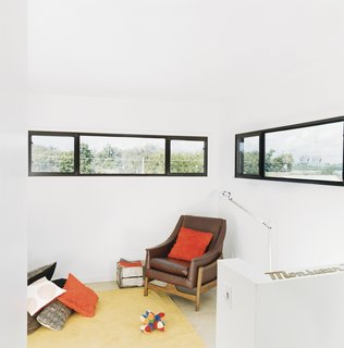 Windows on the third floor frame views of the Mississippi River.