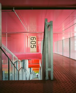 Residents can also ride Denmark's only funicular-style inclined elevator (imported from Switzerland, naturally) to reach their level of residence or drive up to their floor and cross a suspended industrial metal-clad gangplank to reach their hallway.