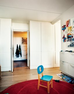 The kids occupy the bedroom, which is small but generously daylit. Of the modest overall size of the place, Zahle says the layout belies the square footage, adding that his kids love it because they can run around outside in the summer.