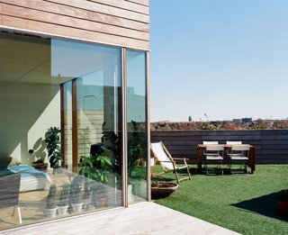 Though the Mountain Dwellings is ten minutes from the city center, "you're completely alone with the sky and with nature," Zahle says. "It's not really like an apartment, it's more like a summer house on a hillside."