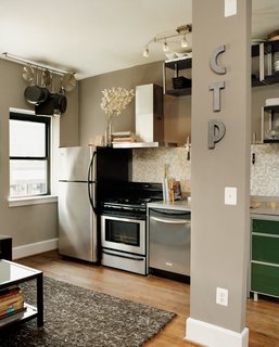 Hoagies' Heroes - Photo 4 of 13 - Patten’s apartment is on the second floor, and though the layouts of the two residences are nearly identical, Patten’s initials on a support column clearly mark this space as his own.