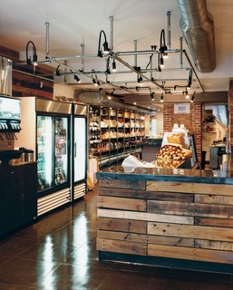 Hoagies' Heroes - Photo 13 of 13 - The market’s shelves are lined with all manner of Italian goodies, and the lighting grid on the ceiling, made of chain-link fence posts, is a nod to the grids common in Italian delis.