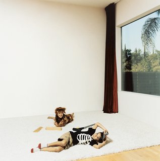Making Sense of the City - Photo 6 of 11 - Mateo and Olivia lounge in the living room that doubles as a screening room.