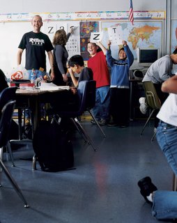 Designers and Studio 5 volunteers Mike Lenhart and Sandy Kitson with their class of fifth-graders at Sunnyside Elementary School in San Francisco. The lesson for the day was letterforms and type. By the end of class, the students had designed monograms of their initials for their own personal portfolios.