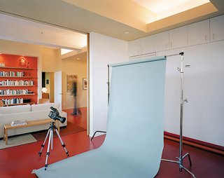 During the day, Dayton’s guest bedroom easily doubles as his photography studio.