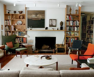One of the few pieces of furniture in the Risom living room not designed by Risom himself is the Egg chair by fellow Dane Arne Jacobsen. A painting by Sven Hammershoj graces the mantle.