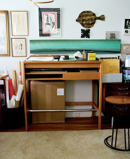 A workstation in Risom’s office (bottom) shows evidence that the designer is still very much active; a pile of sketches sits in the basket to the left of the table, and ephemera from early Jens Risom Design marketing material decorate the wall.