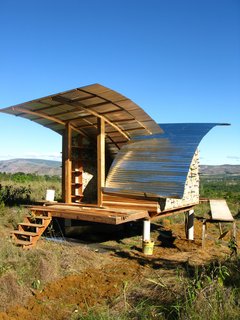 An architectural idealist, Kristofer Nonn answered an online job posting for an ecological builder in Venezuela. The result of his short tenure in the country is two elegantly simple housing shelters. Zinc-corrugated roofing was used to cover the shelters, providing shade and preventing rain from collecting and causing structural deterioration.