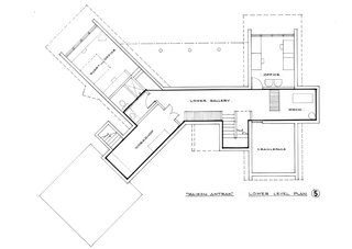 The lower level of Maison Amtrak has two studies, storage space and houses the mechanical equipment for the house. The two bathrooms upstairs are directly over the mechanical services, keeping cost and noise down.