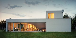 Though the three-bedroom house is two stories, both floors offer "front" lawns on which to hang out, all accessible through sliding glass doors.
