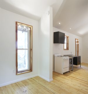 After the house was completed, Rural Studio sold it to a local resident who qualified for the 502 loan, though the cost to her was only that of the land. The 22-year-old nursing school graduate now calls the Pattern Book House "home."<br><br>Photo by <br><br>Ty Cole