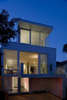 Post-renovation, the back of the house now opens up for the couple to take in the surrounding views--though the updated home itself is pretty picturesque.<br><br>Photo by <br><br>Sharon Risedorph