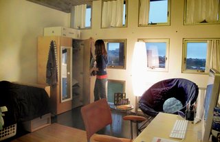 "I Live in a Steven Holl" - Photo 8 of 8 - One of the more spacious singles, Amanda's room has a 3 x 4 array of windows that look out into Boston. "Thank goodness I don't have a curvy wall anymore," says Amanda.