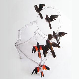 Reiko Kaneko's chair features a flock of birds in flight.