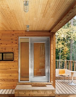 The house is entered through a Visteon steel door by Neoporte, who also provided the solid core birch interior doors.