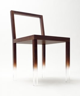 Nendo Takes Over MADProjects Gallery - Photo 1 of 6 - The "Fade-Out" chair, a simple rectangular chair made from clear acrylic and painted with trompe l’oeil wood grain over most of the structure. The pattern fades away on the lower part of the chair legs to create the impression that the chairs are floating in space. Image courtesy Masayuki Hayashi.