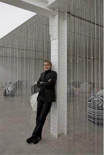Nendo Takes Over MADProjects Gallery - Photo 5 of 6 - Designer Oki Sato, principal of Nendo, in a room filled with a collection of recycled-paper Cabbage Chairs.