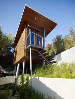 Metaphorically, architect Chris Kempel said, the Kynar-painted steel columns are trees. "It was like taking a box and poking it with chopsticks."