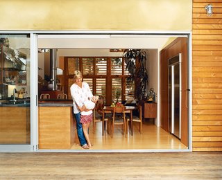 Kim and Gabriella enjoy their kitchen, which spills out onto their backyard deck.