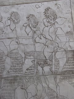 One of the artist's finished panels, depicting sunflowers.
