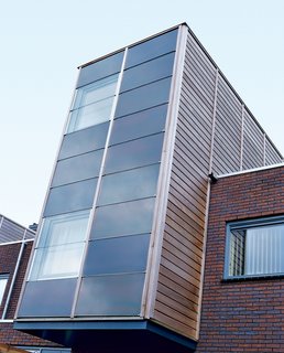 Run by the Sun - Photo 3 of 3 - The solarium was designed "to highlight the solar elements of these buildings as an articulated object," explains Kiss of the protruding glass rooms.