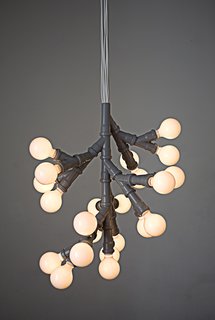 Bunch of Bulbs pendant lamp by KiBiSi. Designed in 2005 with standard plumbing fittings. Limited Edition. <br><br>Photo courtesy of KiBiSi
