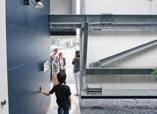 Small Box Home with Black Metal Facade in Japan - Photo 11 of 14 - The house offers endless opportunities for Taiga and Kouga to play.
