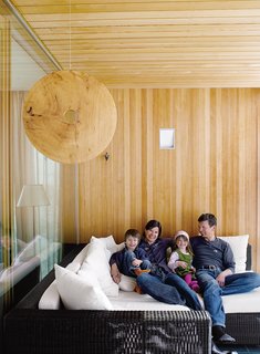 A sun porch off the main living room is one of the family’s favorite parts of the house.