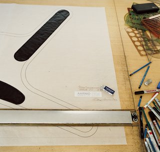 Aarnio works out his designs digitally at a drafting table.