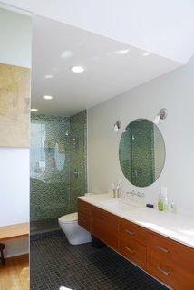 Bedroom Addition in Seattle - Photo 12 of 16 - The view toward the shower space; the vanity runs the nearly the entire length of the wall.