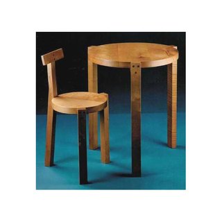 Bo Bardi crafted her Giraffe table and chair from various hardwoods with contrasting dowels.