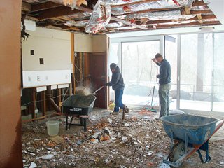 Major renovations were applied to every surface in the house, including the ceiling, which was made of metal mesh lath covered in layers of hand-troweled plaster.