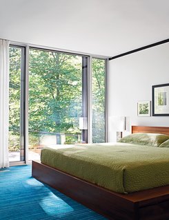 The master suite contains the home's only non-vintage furnishing: a BoConcept bed.