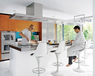 Tomato Pork Chop Rigatoni - Photo 1 of 2 - Despite their fidelity to the original structure, the residents made small changes, notably in the kitchen: The wood-veneered island was moved to create more circulation space behind it and finished in white lacquer and stainless steel. Wood cabinetry above the island was exchanged for a steel ventilation unit.