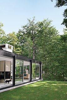 All of the glazing along the house’s 95-foot-long western elevation can be opened to the out of doors.