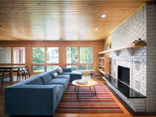 Campbells' Coup - Photo 3 of 12 - George Nelson and Eames furnishings from Michigan companies like Herman Miller blend seamlessly with original decor from Keith Campbell’s childhood home in Ann Arbor. Seen here is the combined living and dining area.