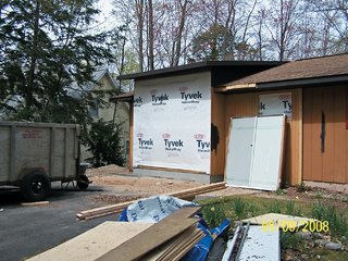 Campbells' Coup - Photo 11 of 12 - While the general form of the exterior remains the same, a fresh color scheme distinguishes the new house from its former identity.